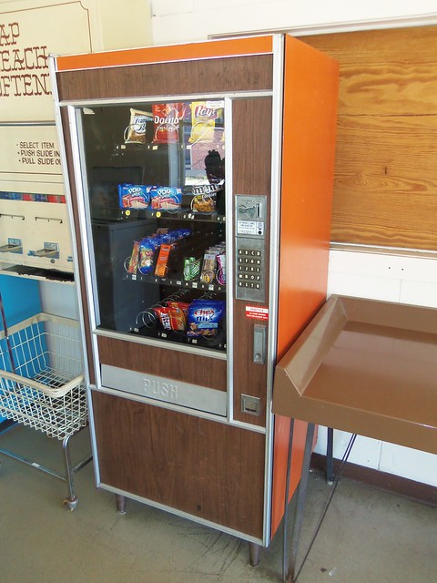 Wood Panel Vending Machine with Orange Siding