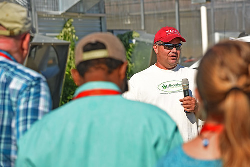 Broadway Hemp's Ryan Patterson speaks to extension agents during a tour of the Harnett County farm.