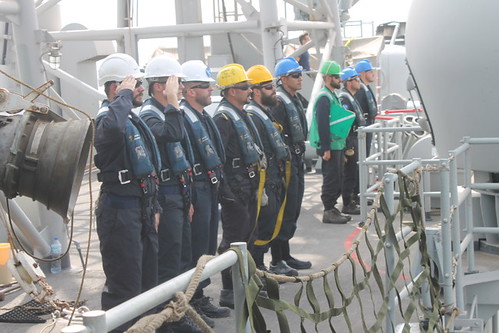 ESPS Santa Maria's sailors salute the crew of USNS Laramie following a Replenishment At Sea