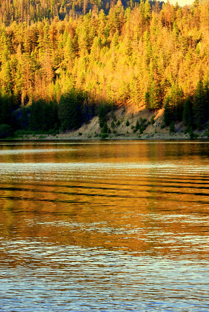 IT'S THE GOLDEN HOUR ON OTTER LAKE.  THE TRANS CANADA TRAIL IS ON THE FAR SHORE.  (TULAMEEN,  BC)