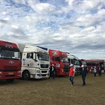 caravan-mongolia-parked trucks-field