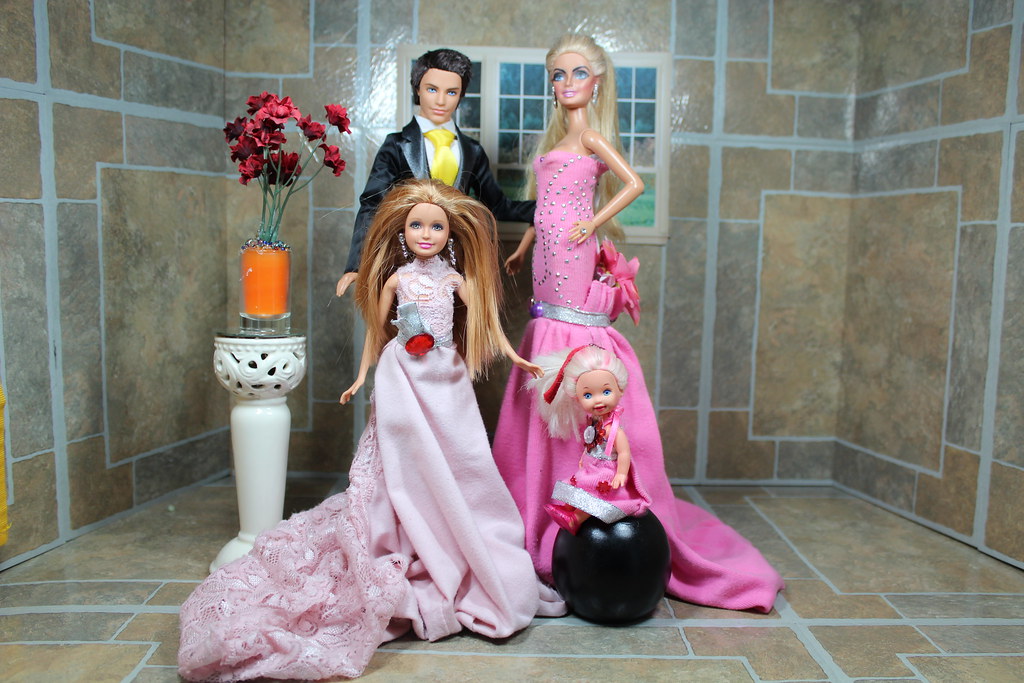 fashion ken doll is wearing a wedding ken (groom suit) BArbie is a bride ba...