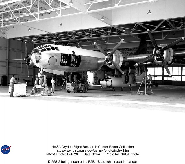 D-558-2 being mounted to P2B-1S launch aircraft in hangar