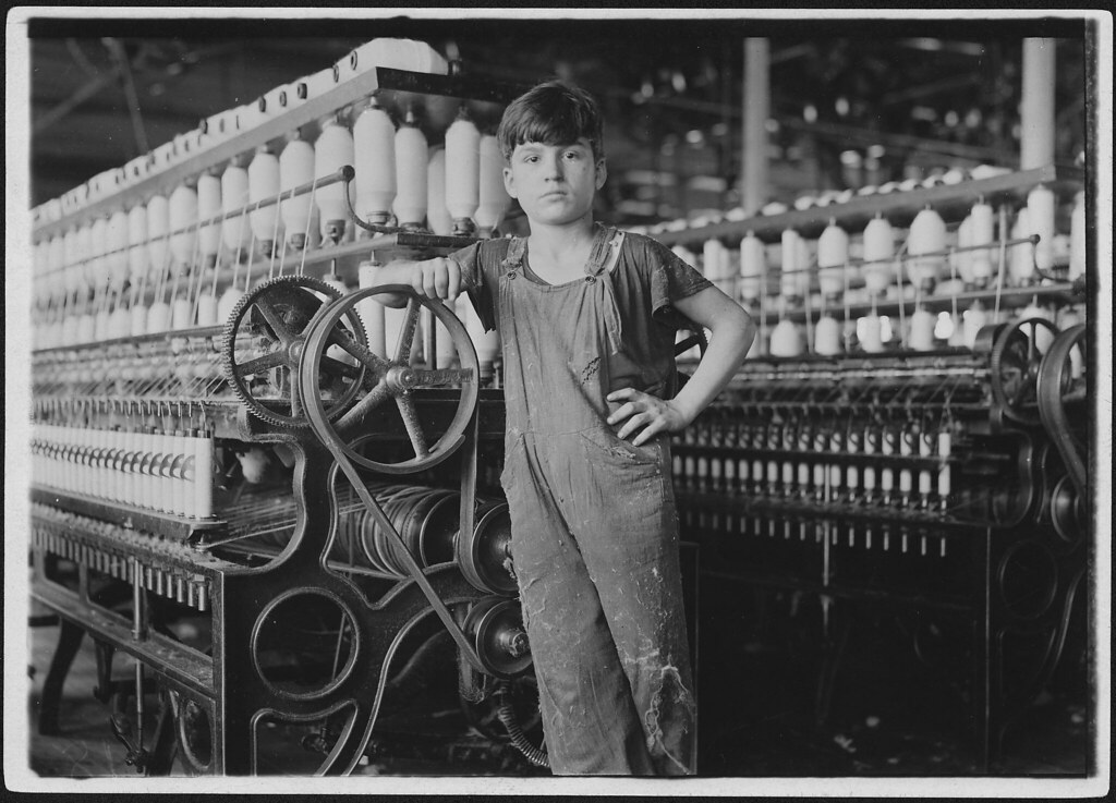 At machine is Stanislaus Beauvais, has worked in spinning room for two years, October 1911