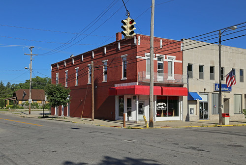 building structure commercial historic prospect ohio marioncounty twostory brick storefronts ca1900 romanesque altered corbelling corbelled rusticated lintels sills threebay mar43715