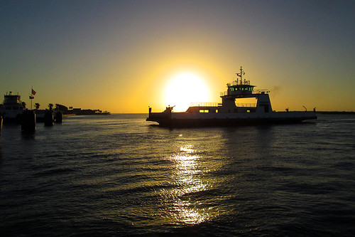 sunset ferry boat ship intercoastal texas bay ocean orange water portaransas tx