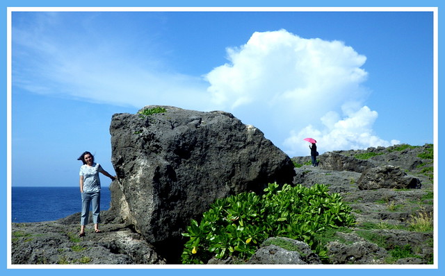 TWO WOMEN, A TYPHOON ROCK, AND A CLOUD