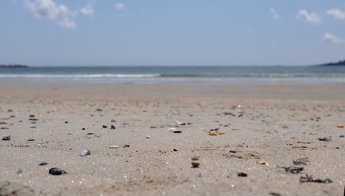 shells beach water clouds sand rocks bonnet narragansett