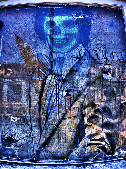 Skull/Paymaster Street Art Under Broken Glass, HDR