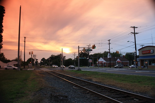 Hazy Summer Sunset Masonville Mount Laurel NJ by blackunigryphon, Labor Day Weekend in Masonville Mount Laurel NJ, by the Train tracks off Arch Road.
Very hot, humid
