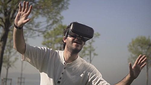 Young Man In Virtual Reality Headset