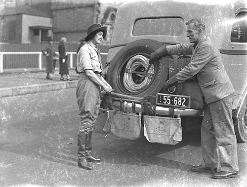 Francis Birtles, his wife of less than two months, Nea, and his touring car in front of the Public Library of New South Wales, Sydney, 9 May 1935 / photographer Sam Hood | by State Library of NSW