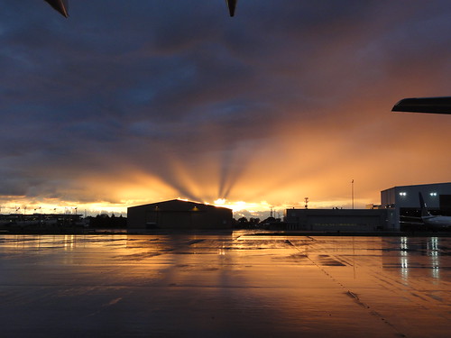 Sunrise by soul_motor, Beautiful sunrise; believe it or not it was raining when I took these. United 737 coming out of the