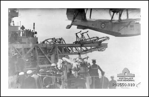 A Supermarine Seagull V aircraft, serial number A2-2, being launched from a catapault on the port side of the Kent class cruiser HMAS Canberra.