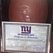 Who wants this giants football signed by in Eli Manning  and Osi