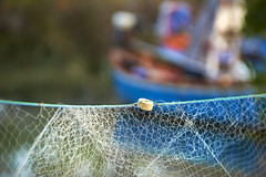 Fishing nets hanging in the marina, Sam Roi Yot, Thailand