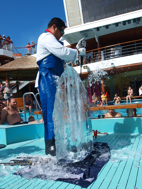 Carnival Magic cruise ship sailing in the middle of the Gulf of Mexico 2013 A head chef is cutting or making a ice sculpture next to a swimming pool