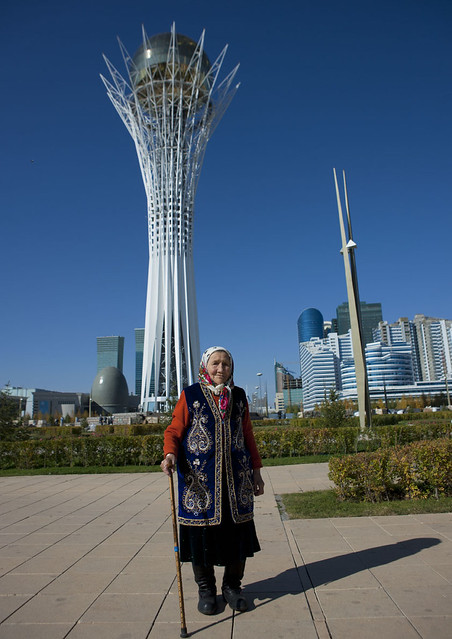 Grand Mother In Front Of Baiterek Tower, Astana, Kazakhstan