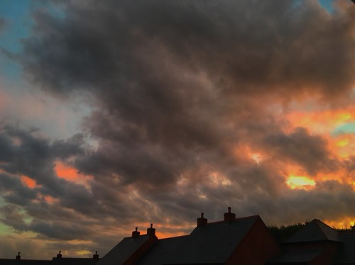 Somebody, Somewhere.... by Wizard Snaps, Is getting a great sunset tonight. Sometimes I wish we lived on the coast....