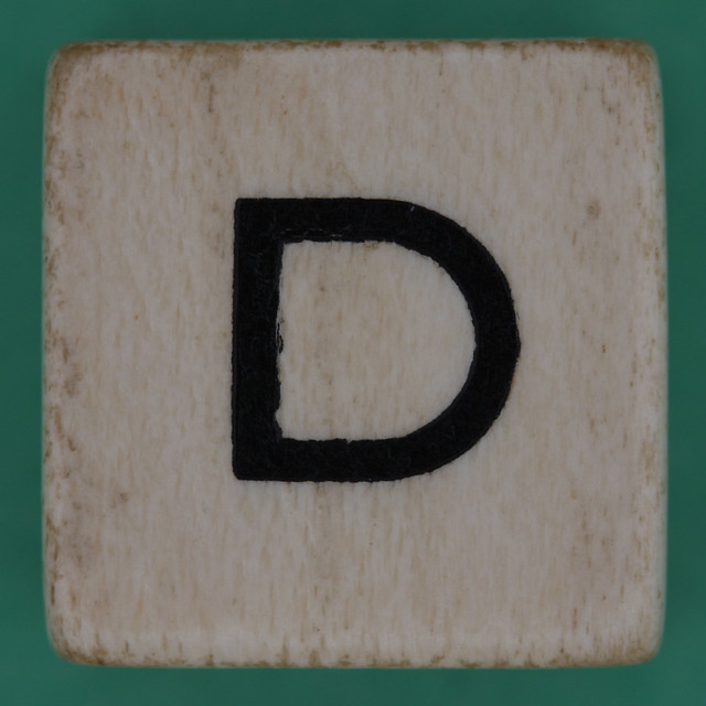Spill and Spell Dice Letter D