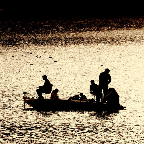 family sunset lake boat fishing silhouettes crew rod recreation motorboat sportsman reel boatingsafety procraft img985021