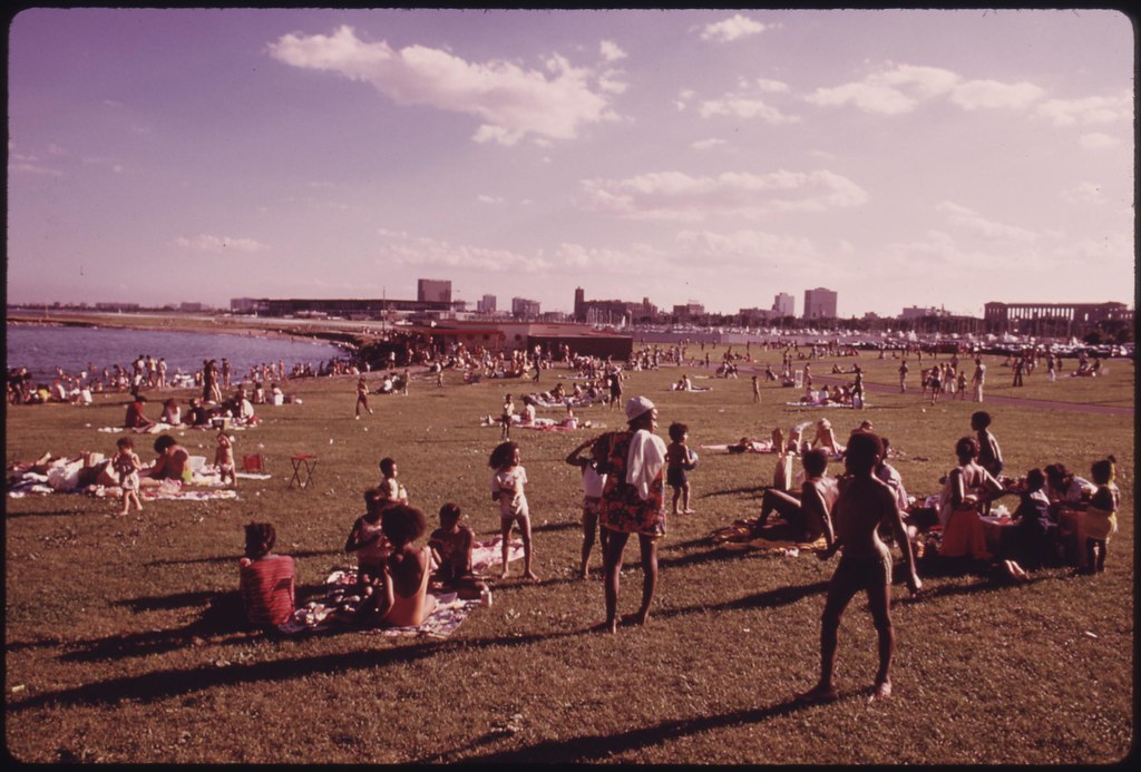 Chicago families socialize in the sun at the 12th Street beach on Lake  Michigan, Illinois, August, 1973. Image courtesy John White/US National  Archives Stock Photo - Alamy