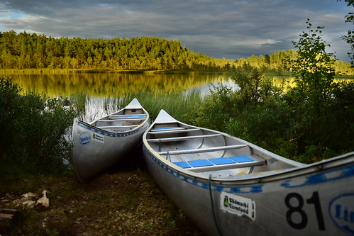 canoes by riverside | by Jani pritchard