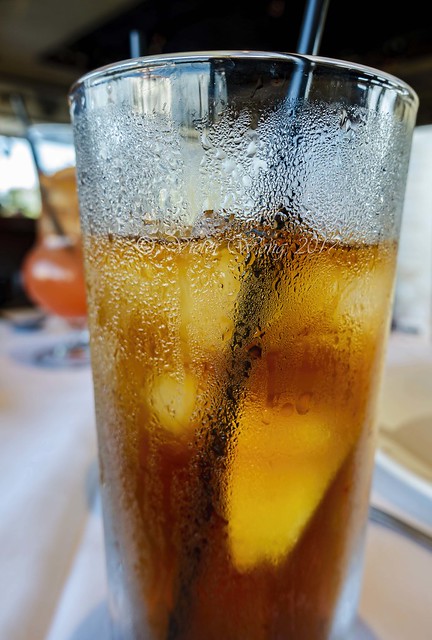 Close-up of a glass of ice cold soft drink