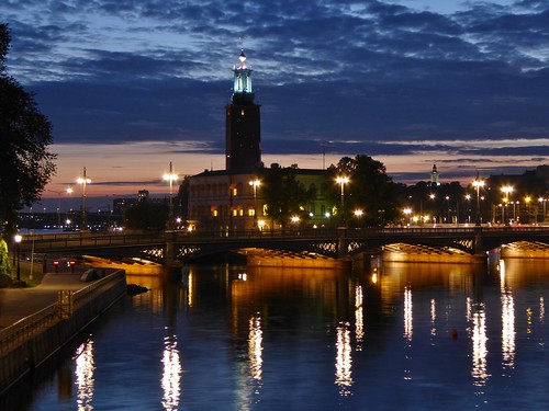 city hall stadshuset stockholm se blue hour cloud sunset water reflection bridge