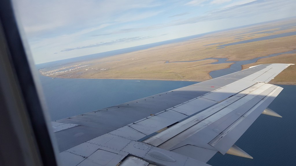 On approach to Barrow, Alaska.  The flat Arctic tundra (no trees can grow here) will soon be covered with snow.
