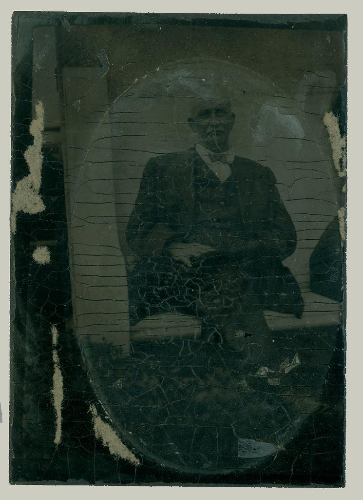 Oval portrait of a seated  man
