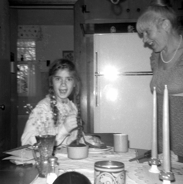 My sister about an eighth of a second after I threw a piece of baloney at her and whipped out the camera to capture her reaction. No time to frame the shot... just hoped that the Flashcube goes off! (it did). Milford Connecticut. March 1972