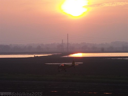 california sunset plane afternoon rice fields norcal marysville cropduster yubacounty