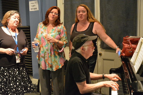 Holley Bendtsen, Yvette Voelker, and Debbie Davis of Pfister Sisters with Amasi Miller on piano. Photo by Kichea S Burt.