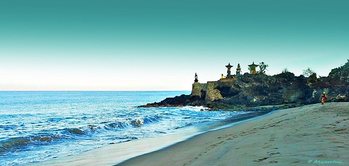 temple beach blue water waves sea seascape sand horizon coast coral rock ocean outdoor seaside lombok