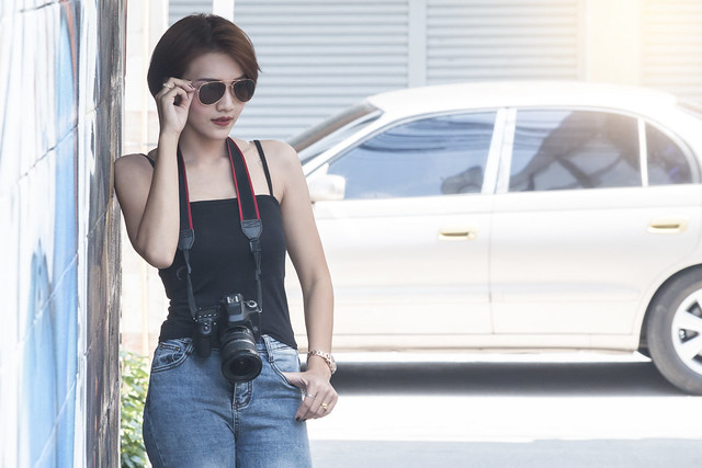 Young asian women with dslr camera