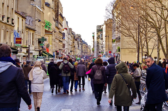 Paris janvier 2015 - 18 - People are walking to the start of the Je suis Charlie March on sunday january 11th down rue Oberkampf