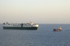 Gulf Of Suez At Anchor Awaiting Canal Transit. Little And Large.