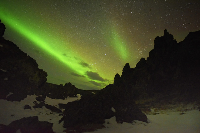 Northern Lights over lava rocks in Iceland