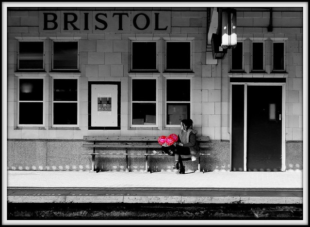 Girl with balloons, Bristol Temple Meads station.