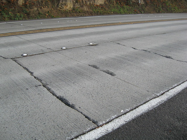 Deteriorating and cracked concrete panel on SR 900