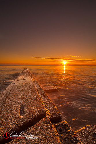 park blue orange sun beach nature water composite wisconsin clouds sunrise canon landscape waves place unitedstates horizon lakemichigan greatlakes shore grantpark sunburst hdr breakwater mke landscapephotography shorefront southmilwaukee discoverwisconsin travelwisconsin 5dmarkiii andrewslaterphotography