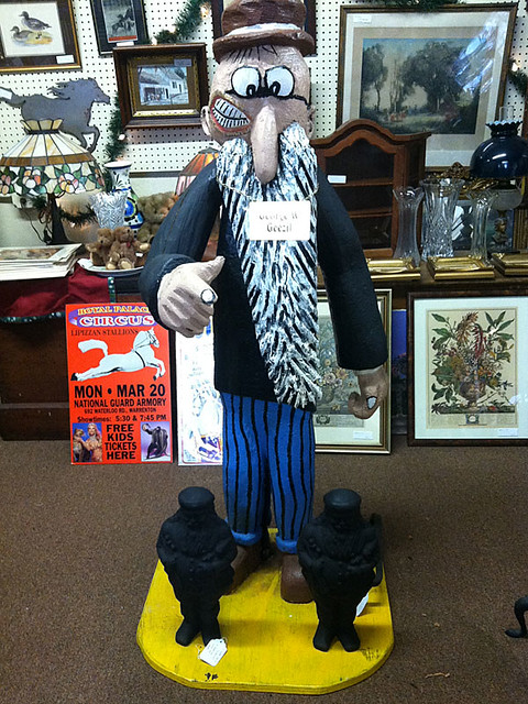 Ed Geezil George W. Geezil, made from a single log | A minor character… | Flickr