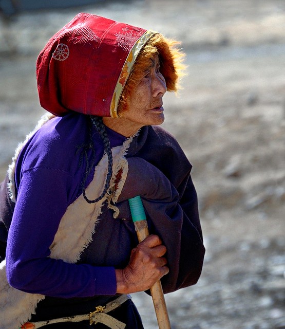 Tibetan Lady in front of Sershul monastery, Tibet 2014
