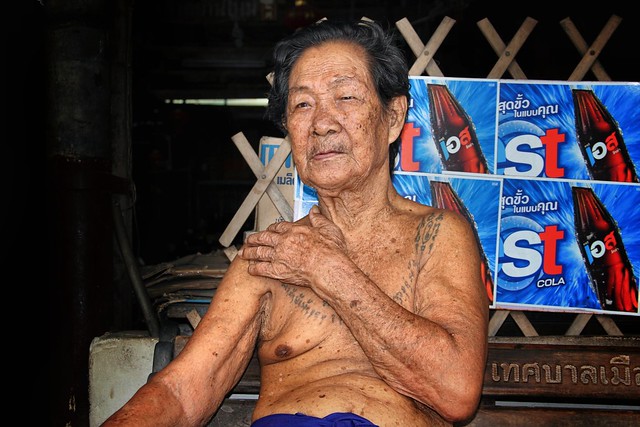 Old man protected by sacred ink of Yantra tattoo
