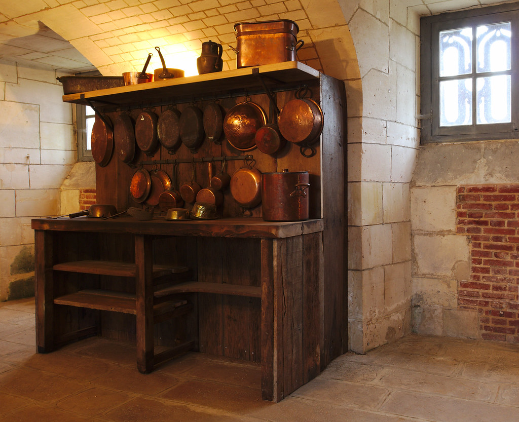 Copper pots in the kitchen of a castle