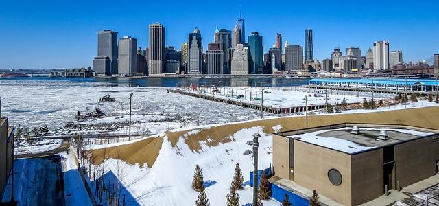 Lower Manhattan skyline & partially frozen East River