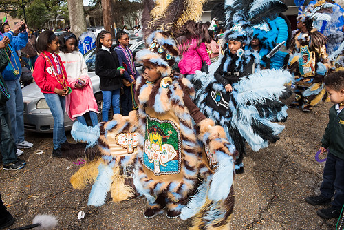 Princess Amiya and Little Queen Cass walk infront of classmates the Thursday before Mardi Gras on February 8, 2018. Photo by rhrphoto.com.