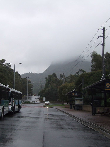 A view of the bus stop and the mountain