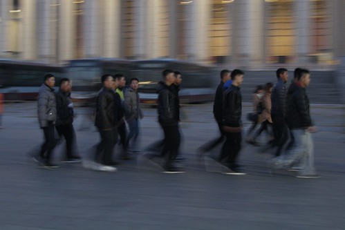 Undercover police march back to their barracks following their day at Tiananmen Square